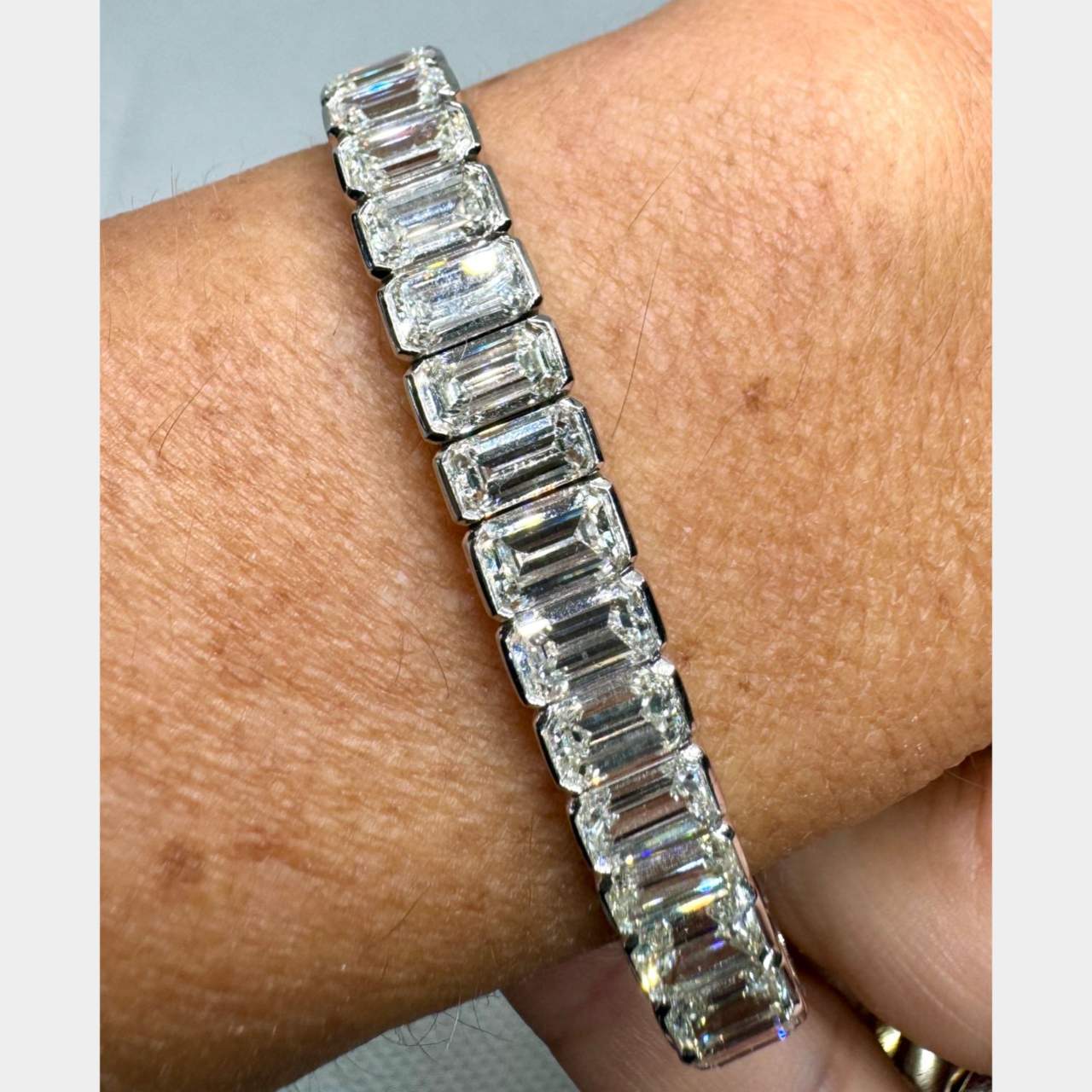 Platinum Graduated 30.50 Ct. Emerald-cut Diamond Tennis Bracelet