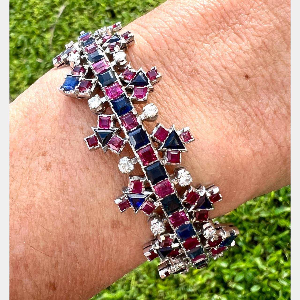 1960’s 18K White Gold Diamond, Sapphire, and Ruby Bangle Bracelet