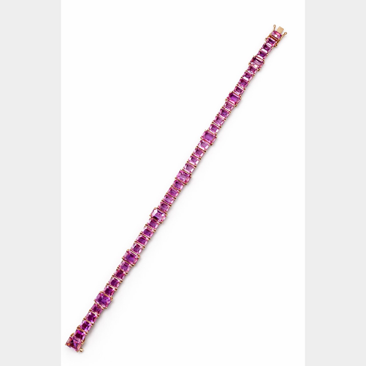 18K Yellow Gold 26.00 Ct. GIA Certified Pink Sapphire Bracelet 18K Yellow Gold 26.00 Ct. GIA Certified Pink Sapphire Bracelet